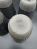 RAW Matte Black Speckled Stoneware Dinnerware Set of 20